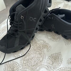 On Cloud Black Running Shoes - Rear View - Women’s